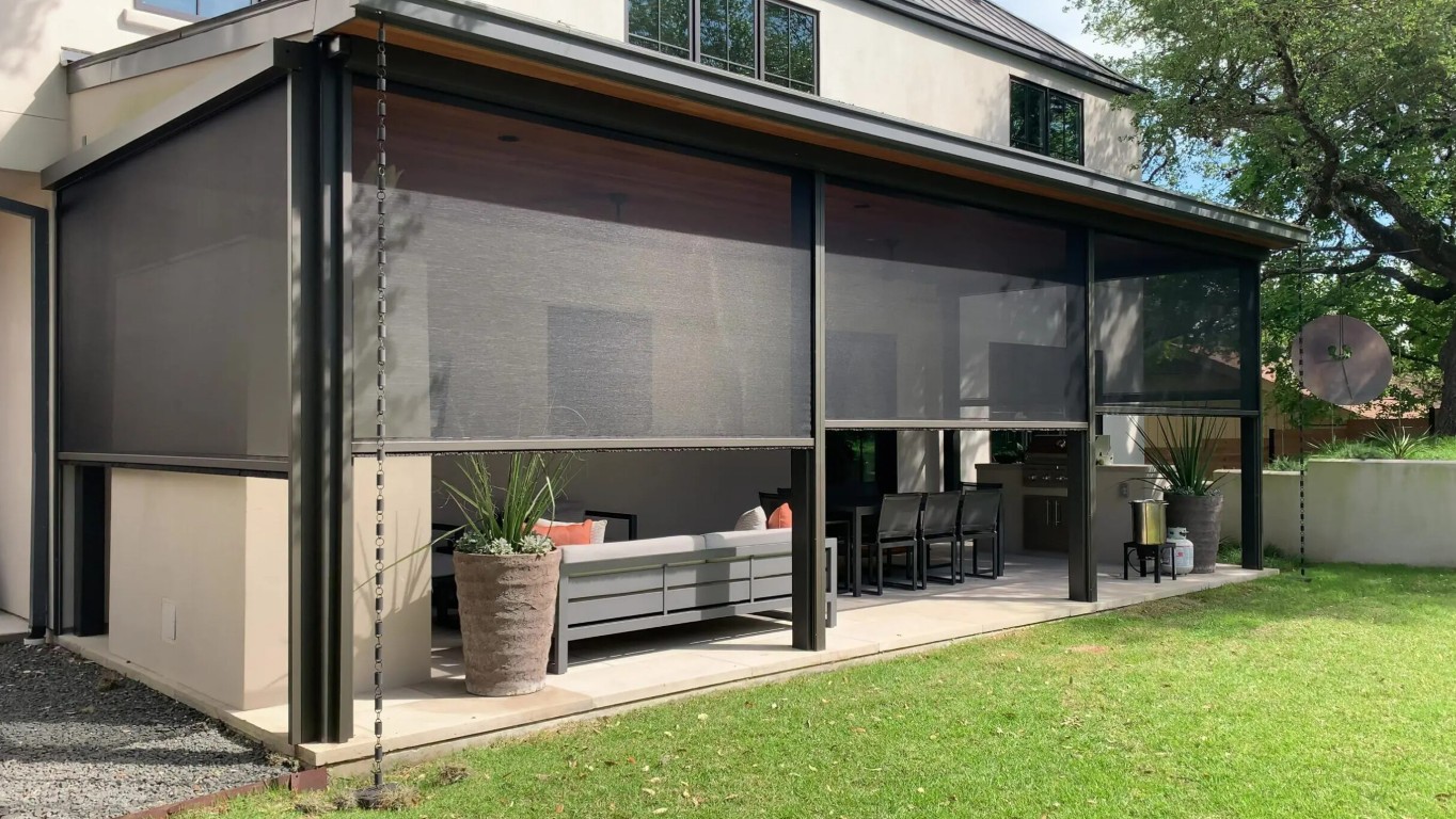 Modern patio cover with retractable screens and outdoor seating